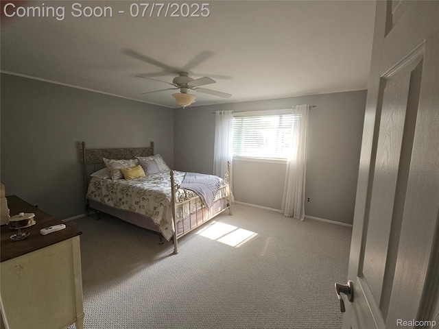 38412 Sutton Dr, Sterling Heights, MI 48310 - carpeted bedroom featuring baseboards and a ceiling fan