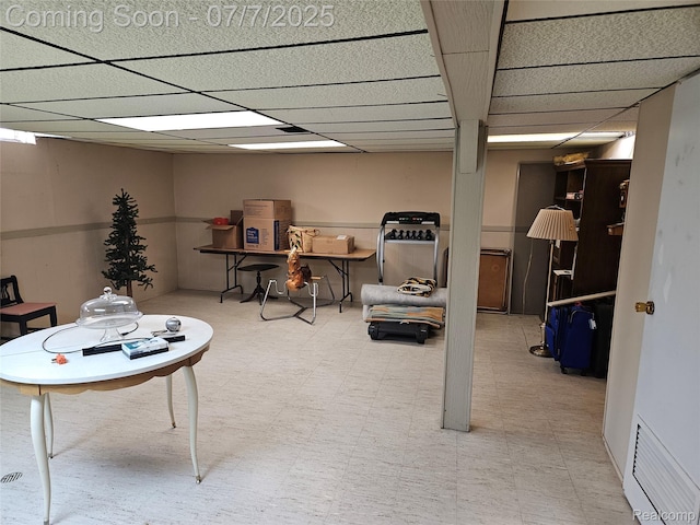 38412 Sutton Dr, Sterling Heights, MI 48310 - finished below grade area featuring a drop ceiling and tile patterned floors