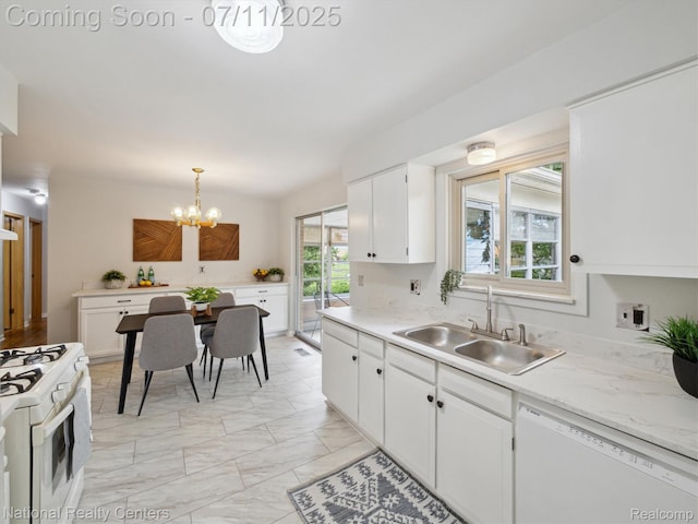 29620 Oakview St, Livonia, MI 48154 - kitchen with white appliances, a chandelier, light marble finish floors, white cabinetry, and light countertops