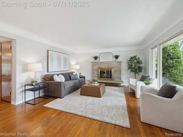 29620 Oakview St, Livonia, MI 48154 - living area featuring hardwood / wood-style floors and a fireplace