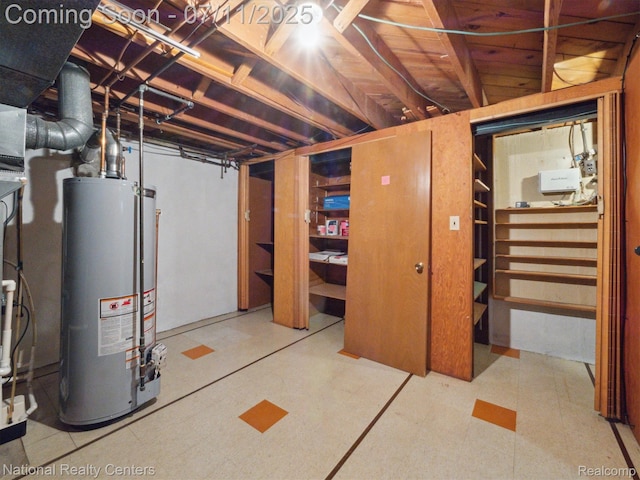 29620 Oakview St, Livonia, MI 48154 - unfinished basement with gas water heater and tile patterned floors