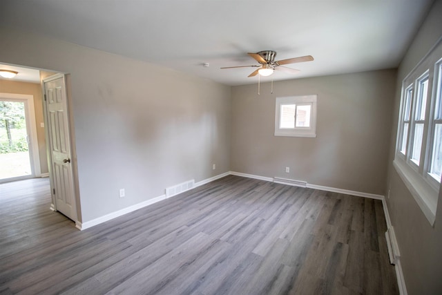 3745 Holly Ave, Flint, MI 48506 - unfurnished room with wood finished floors and ceiling fan
