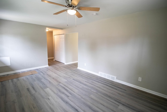 3745 Holly Ave, Flint, MI 48506 - spare room featuring a ceiling fan, wood finished floors, and a smoke detector