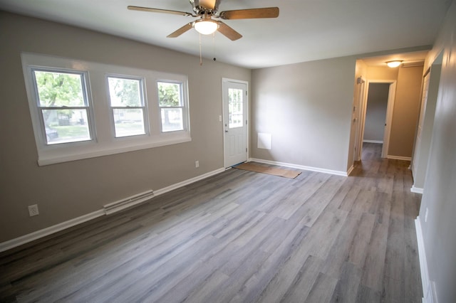 3745 Holly Ave, Flint, MI 48506 - unfurnished room featuring a ceiling fan and wood finished floors