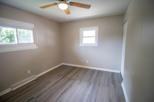 3745 Holly Ave, Flint, MI 48506 - spare room with a ceiling fan and dark wood finished floors