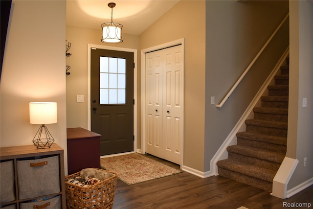 18006 Wingate Dr, Macomb, MI 48042 - foyer with wood finished floors, stairs, and lofted ceiling