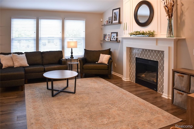 18006 Wingate Dr, Macomb, MI 48042 - living room with a tile fireplace and dark wood-style floors