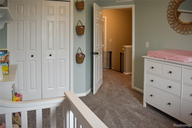 18006 Wingate Dr, Macomb, MI 48042 - bedroom with dark carpet and a closet