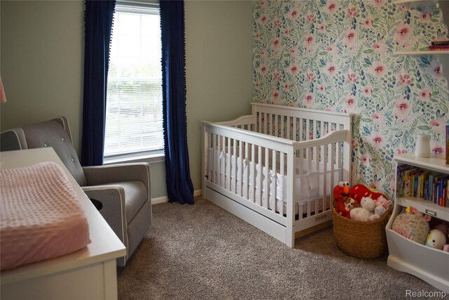 18006 Wingate Dr, Macomb, MI 48042 - carpeted bedroom with a nursery area and baseboards