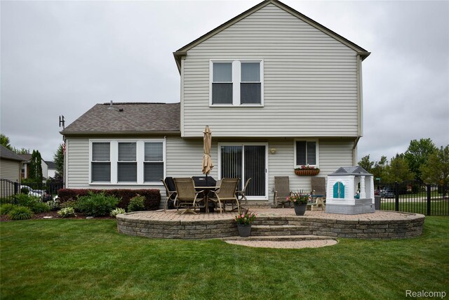 18006 Wingate Dr, Macomb, MI 48042 - back of property featuring a patio