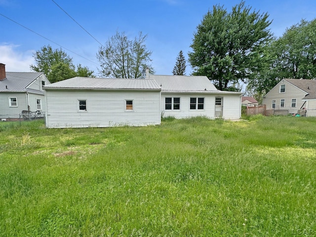 2171 Harold St, Adrian, MI 49221 - rear view of house featuring a metal roof