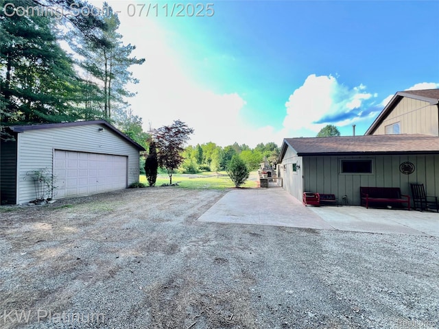 7135 Gardner Line Rd, Lexington, MI 48450 - view of yard featuring an outbuilding and a garage