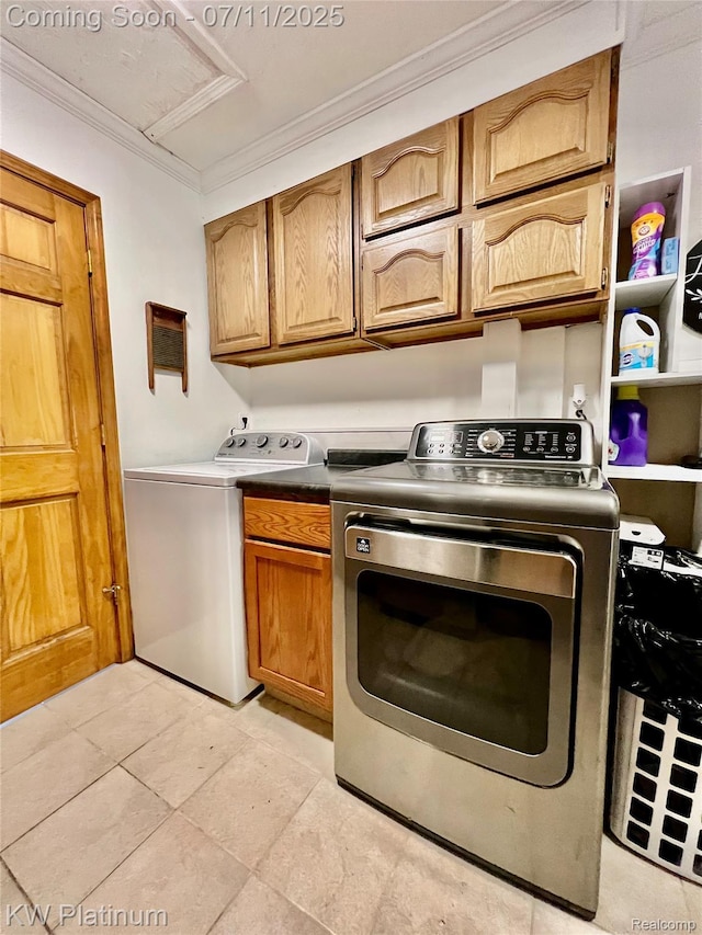 7135 Gardner Line Rd, Lexington, MI 48450 - laundry area with cabinet space, separate washer and dryer, ornamental molding, and light tile patterned floors