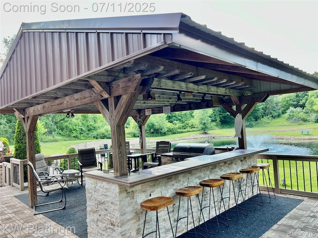7135 Gardner Line Rd, Lexington, MI 48450 - view of patio / terrace featuring a grill and a water view