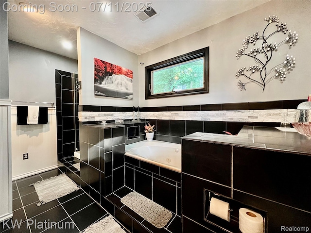 7135 Gardner Line Rd, Lexington, MI 48450 - full bath with a tub with jets, tile patterned floors, and wainscoting