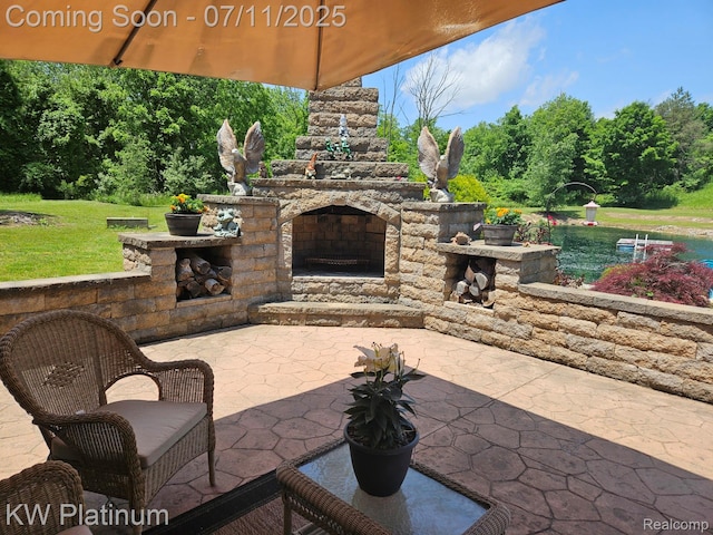 7135 Gardner Line Rd, Lexington, MI 48450 - view of patio featuring an outdoor stone fireplace