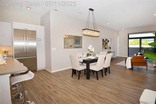 750 Forest Ave Unit 202, Birmingham, MI 48009 - dining space with light wood finished floors and recessed lighting