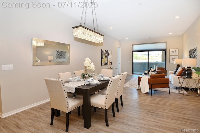 750 Forest Ave Unit 202, Birmingham, MI 48009 - dining area with light wood-type flooring, recessed lighting, and a chandelier