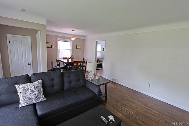 24271 Westhampton St, Oak Park, MI 48237 - living room with dark wood finished floors and baseboards