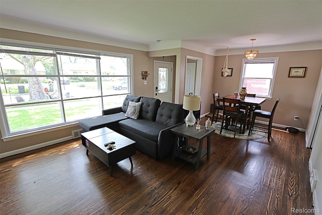 24271 Westhampton St, Oak Park, MI 48237 - living room with dark wood-style flooring and baseboards