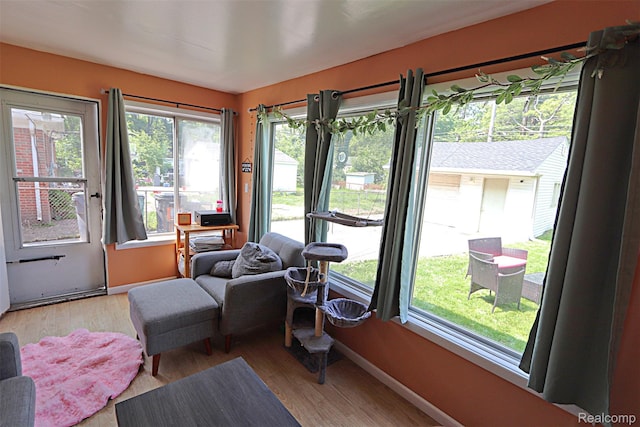 24271 Westhampton St, Oak Park, MI 48237 - sunroom / solarium featuring plenty of natural light and wood finished floors