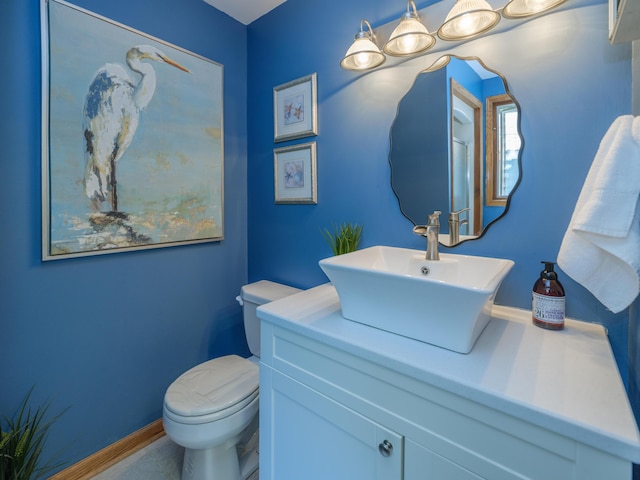44850 Woodman Dr, Paw Paw, MI 49079 - bathroom with toilet and vanity