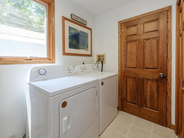 44850 Woodman Dr, Paw Paw, MI 49079 - washroom with independent washer and dryer and light tile patterned flooring