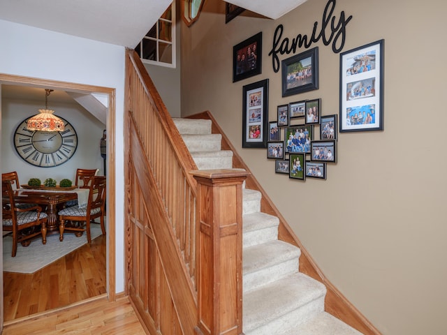 44850 Woodman Dr, Paw Paw, MI 49079 - stairs featuring wood finished floors