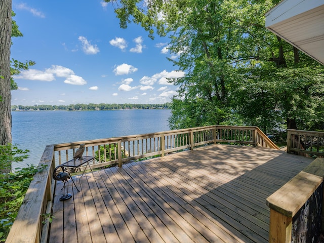 44850 Woodman Dr, Paw Paw, MI 49079 - wooden deck featuring a water view