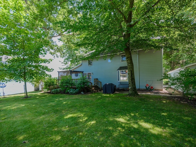 44850 Woodman Dr, Paw Paw, MI 49079 - rear view of house with a wooden deck and a yard