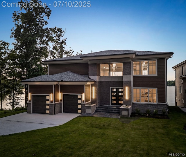 1760 Hamilton Dr, Bloomfield Hills, MI 48302 - view of front of property featuring a garage, a front yard, concrete driveway, and brick siding