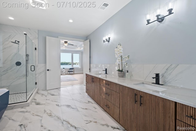1760 Hamilton Dr, Bloomfield Hills, MI 48302 - bathroom featuring a marble finish shower, double vanity, marble look tiles, a ceiling fan, and recessed lighting