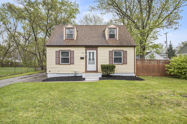 46 N 31st St, Battle Creek, MI 49015 - cape cod home featuring a shingled roof