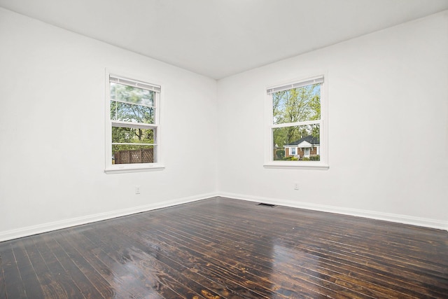 46 N 31st St, Battle Creek, MI 49015 - empty room featuring wood-type flooring and baseboards