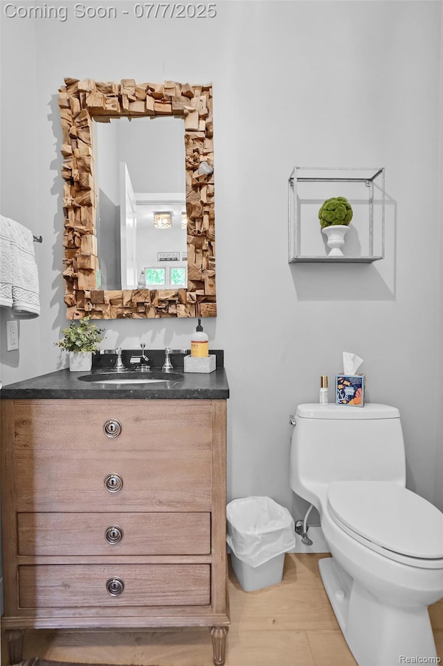 2545 Hartun Dr, Brighton, MI 48114 - half bath featuring vanity and wood finished floors