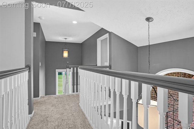 2545 Hartun Dr, Brighton, MI 48114 - hall with an upstairs landing and carpet floors