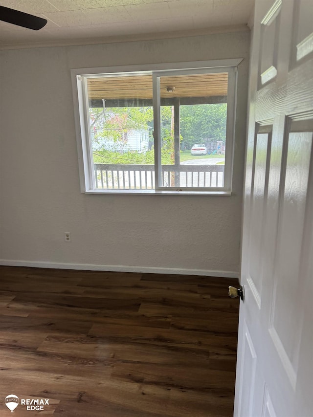 11454 Haven St, Clio, MI 48420 - empty room with wood finished floors and ornamental molding