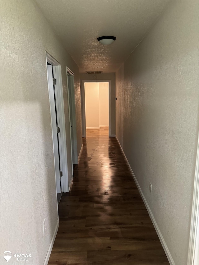 11454 Haven St, Clio, MI 48420 - hall with a textured wall and wood finished floors