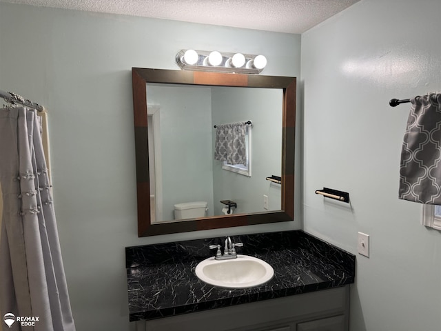 11454 Haven St, Clio, MI 48420 - bathroom with vanity and a textured ceiling