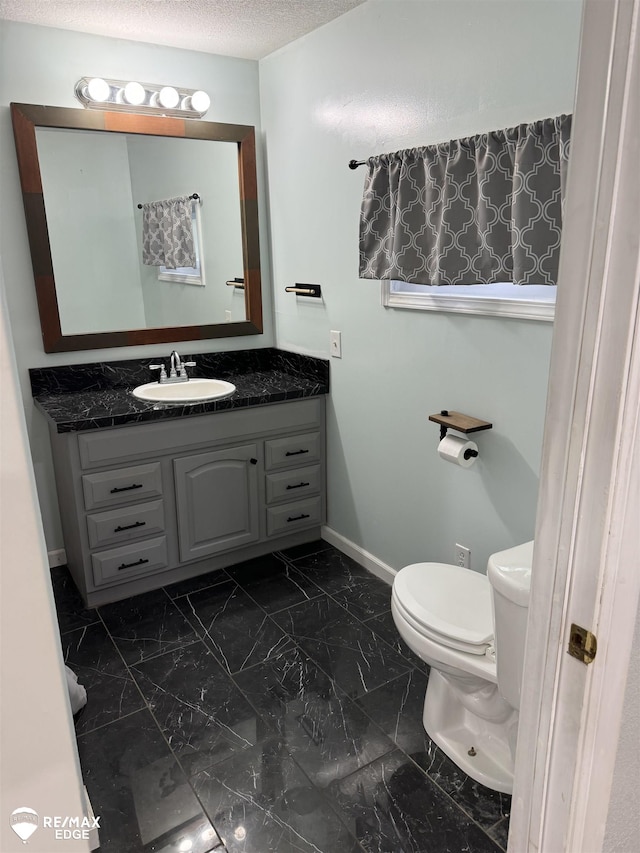 11454 Haven St, Clio, MI 48420 - bathroom with vanity and marble look tiles