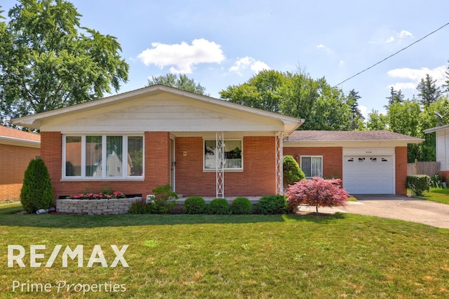 2524 Whitemore Pl, Saginaw, MI 48602 - ranch-style house with a garage, a front yard, driveway, and brick siding