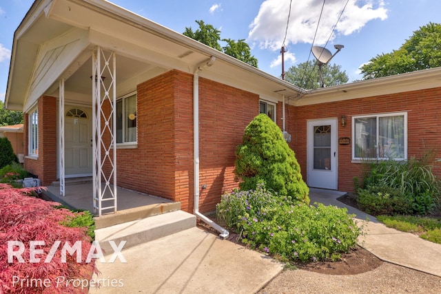 2524 Whitemore Pl, Saginaw, MI 48602 - entrance to property featuring brick siding and covered porch