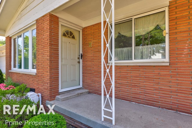 2524 Whitemore Pl, Saginaw, MI 48602 - property entrance with brick siding