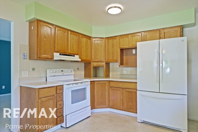 2524 Whitemore Pl, Saginaw, MI 48602 - kitchen featuring white appliances, under cabinet range hood, backsplash, and light countertops