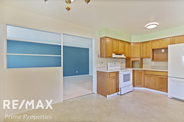 2524 Whitemore Pl, Saginaw, MI 48602 - kitchen with white appliances, under cabinet range hood, tasteful backsplash, and light countertops