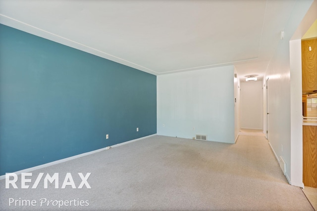 2524 Whitemore Pl, Saginaw, MI 48602 - carpeted empty room featuring baseboards