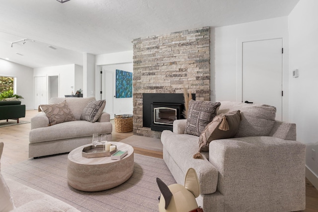 295 N Lakeshore Dr, Holland, MI 49424 - living area with wood finished floors and a fireplace