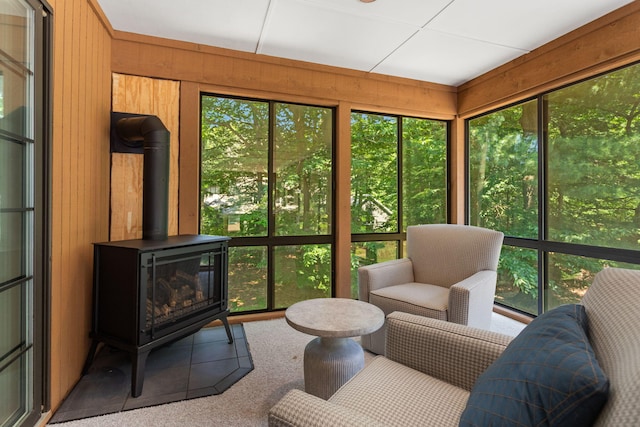 295 N Lakeshore Dr, Holland, MI 49424 - sunroom featuring a wood stove