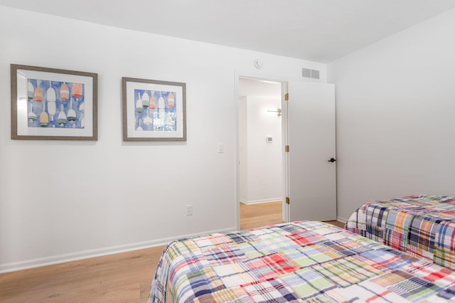 295 N Lakeshore Dr, Holland, MI 49424 - bedroom featuring light wood-style flooring