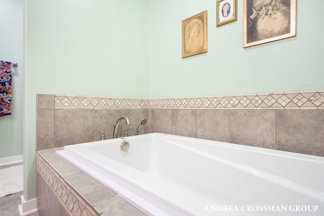 1228 Shore Crest Dr, South Haven, MI 49090 - bathroom featuring a bath and baseboards